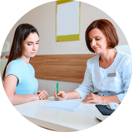 A young girl with a healthcare professional